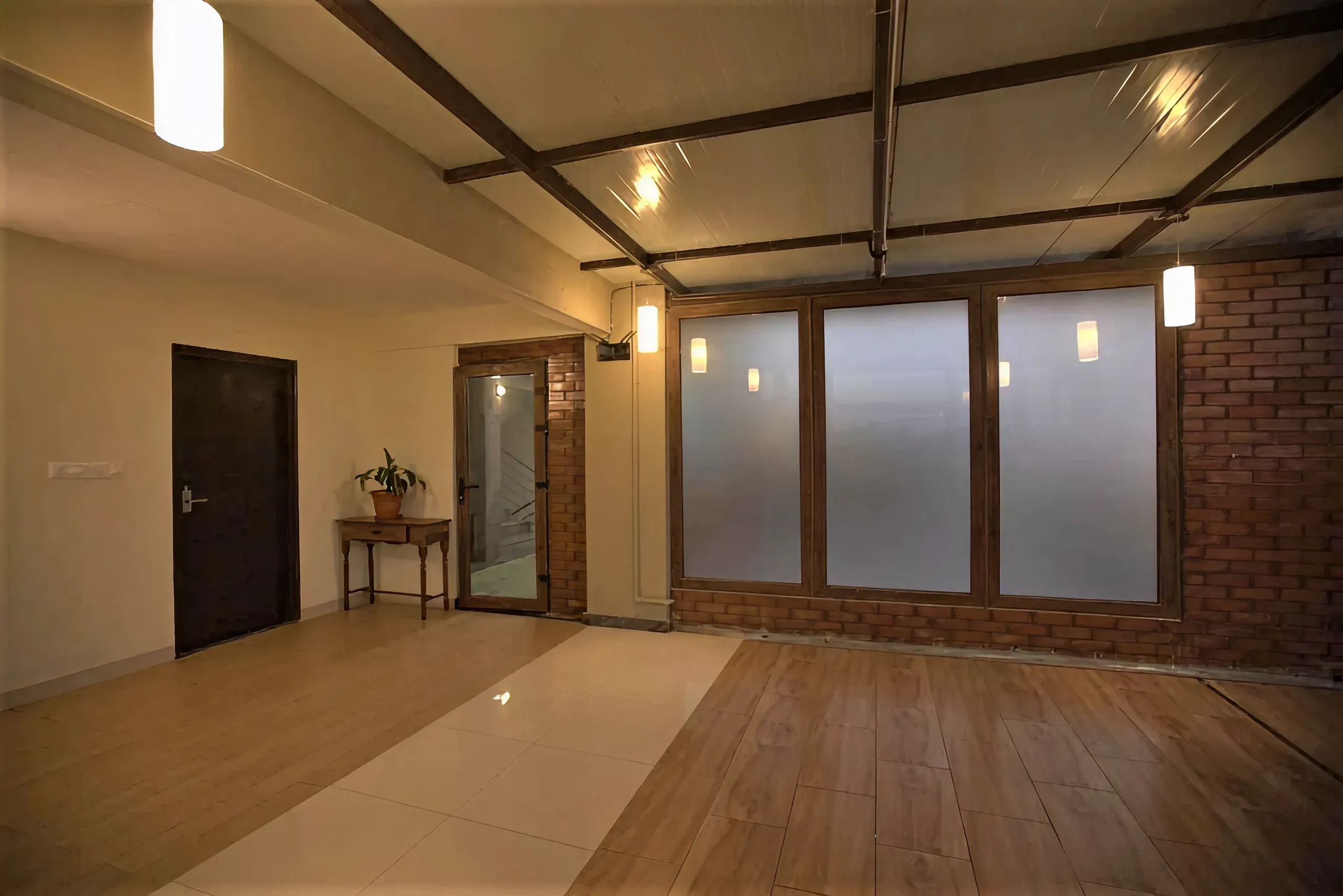 Luxurious hotel bedroom with king bed and workspace